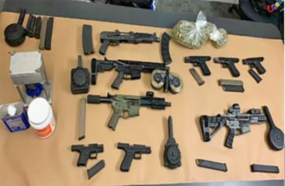 seized-items-drug-and-weapons-bust.jpeg